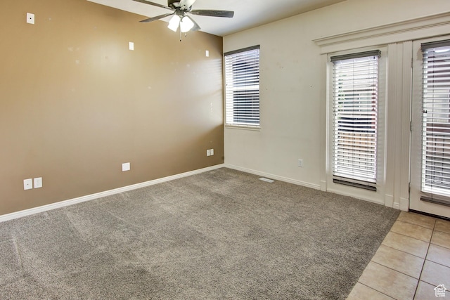 888 N Shepard Creek Pkwy W, Farmington, UT 84025 - empty room with ceiling fan, carpet floors, and tile patterned floors