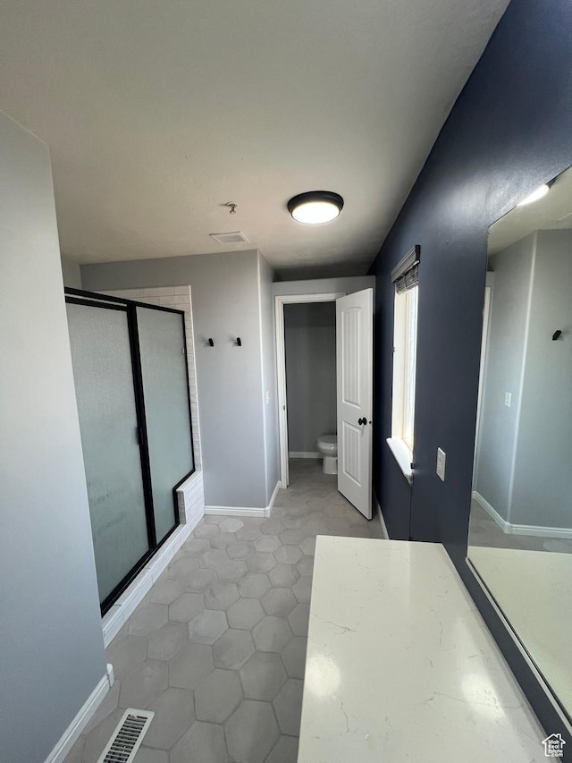 888 N Shepard Creek Pkwy W, Farmington, UT 84025 - full bathroom featuring a shower stall and tile patterned flooring