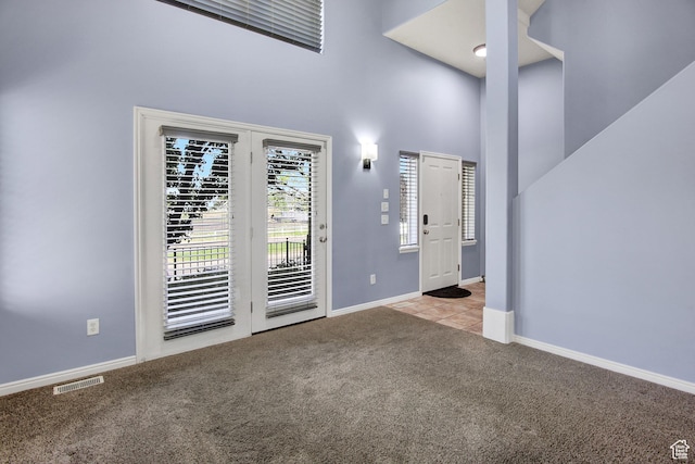 888 N Shepard Creek Pkwy W, Farmington, UT 84025 - carpeted empty room with a high ceiling and baseboards