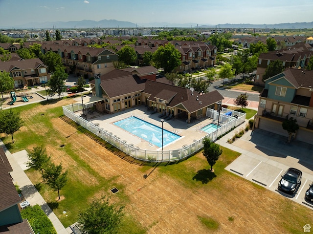 888 N Shepard Creek Pkwy W, Farmington, UT 84025 - aerial perspective of suburban area with a pool area and a mountainous background