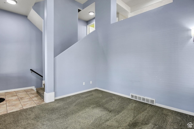 888 N Shepard Creek Pkwy W, Farmington, UT 84025 - staircase featuring carpet flooring and tile patterned floors