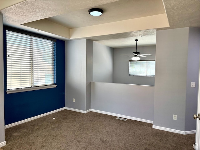 888 N Shepard Creek Pkwy W, Farmington, UT 84025 - carpeted empty room featuring ceiling fan, healthy amount of natural light, and a tray ceiling