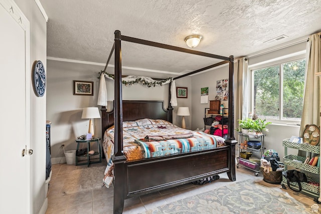 986 E 2290 N, Monroe, UT 84754 - bedroom with tile patterned flooring and a textured ceiling
