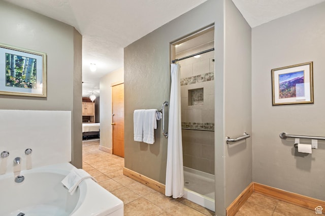 986 E 2290 N, Monroe, UT 84754 - bathroom with connected bathroom, tile patterned floors, a bath, and a tile shower