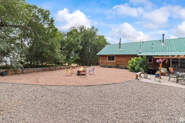 986 E 2290 N, Monroe, UT 84754 - view of yard featuring an outdoor fire pit and a patio area