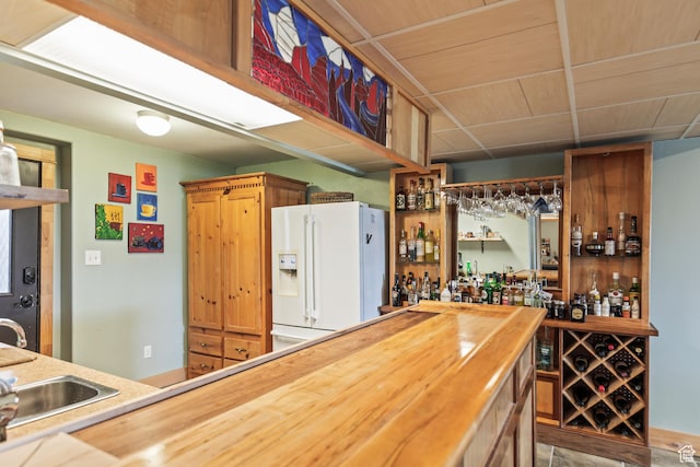 986 E 2290 N, Monroe, UT 84754 - indoor wet bar featuring white fridge with ice dispenser and wooden ceiling