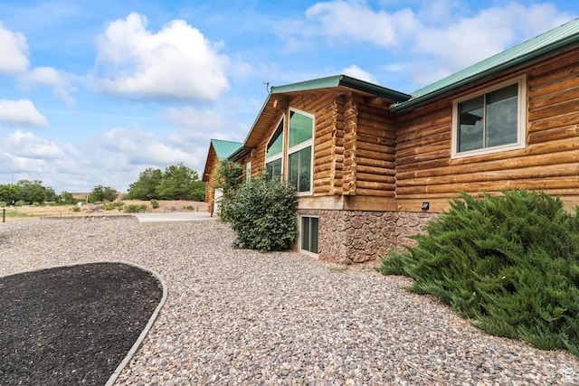 986 E 2290 N, Monroe, UT 84754 - view of side of property featuring log exterior and a metal roof
