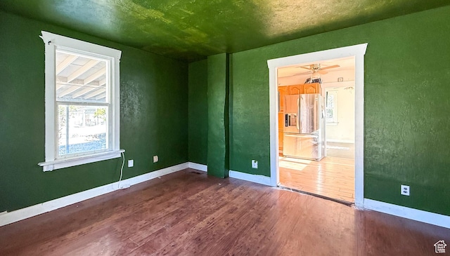 347 Hill St, Helper, UT 84526 - unfurnished room featuring wood finished floors and baseboards