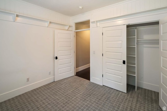 5843 W Wildflower Ln, Highland, UT 84003 - unfurnished bedroom featuring carpet flooring, ornamental molding, and a closet