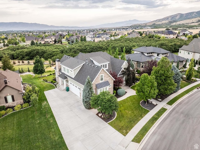 5843 W Wildflower Ln, Highland, UT 84003 - aerial perspective of suburban area featuring mountains