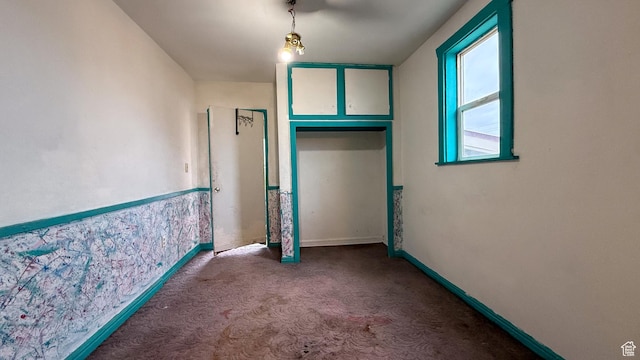 127 Grassy Dr, East Carbon, UT 84520 - corridor with carpet floors and baseboards