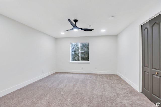 12060 S Lampton Dr W, Riverton, UT 84065 - spare room with a ceiling fan, carpet flooring, a smoke detector, and recessed lighting