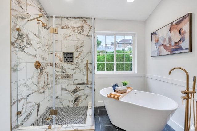 12060 S Lampton Dr W, Riverton, UT 84065 - full bathroom with a freestanding tub, a marble finish shower, tile patterned floors, and wainscoting