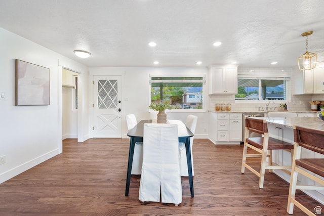 1767 N 1400 W, Provo, UT 84604 - dining room featuring dark wood-style floors, a textured ceiling, healthy amount of natural light, and recessed lighting