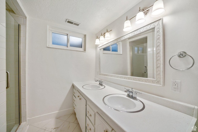 1767 N 1400 W, Provo, UT 84604 - bathroom featuring double vanity, a stall shower, and a textured ceiling