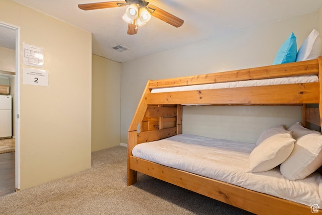 283 S 400 W, Hurricane, UT 84737 - carpeted bedroom featuring freestanding refrigerator and ceiling fan