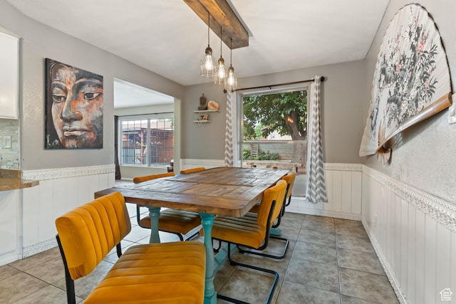 283 S 400 W, Hurricane, UT 84737 - tiled dining space with a wainscoted wall and a decorative wall