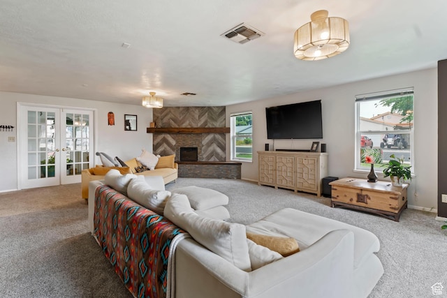 283 S 400 W, Hurricane, UT 84737 - carpeted living room featuring french doors, plenty of natural light, and a fireplace