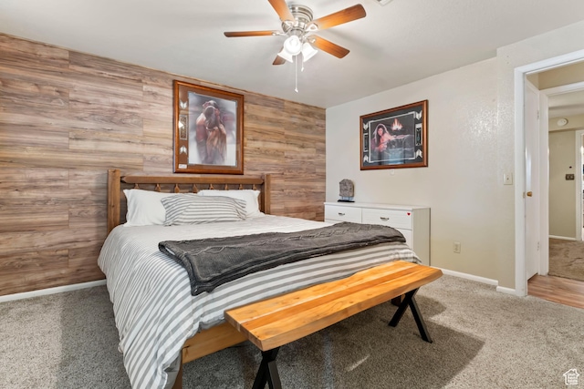 283 S 400 W, Hurricane, UT 84737 - bedroom with light colored carpet, wood walls, and a ceiling fan