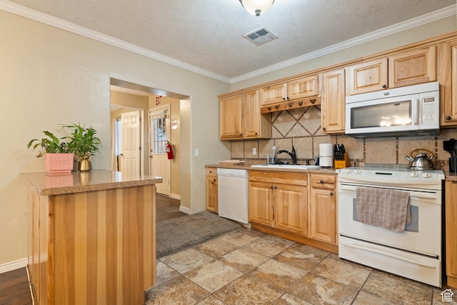283 S 400 W, Hurricane, UT 84737 - kitchen with white appliances, decorative backsplash, ornamental molding, and light countertops