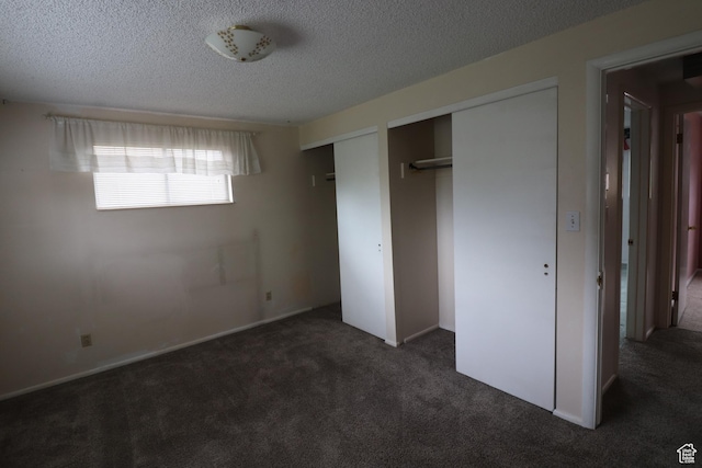 547 E 6295 S, Murray, UT 84107 - unfurnished bedroom with carpet, two closets, and a textured ceiling