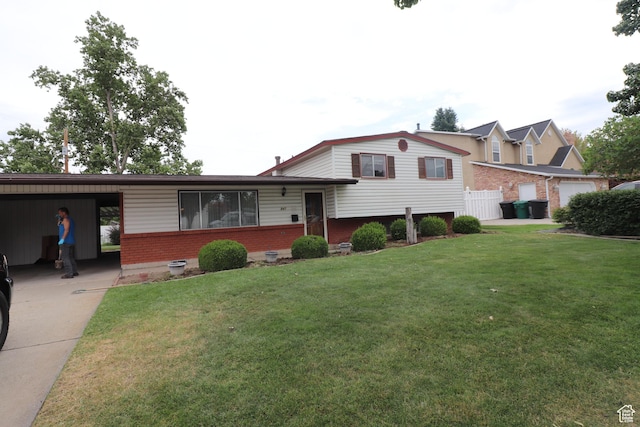 547 E 6295 S, Murray, UT 84107 - tri-level home featuring brick siding, a front lawn, an attached carport, and driveway
