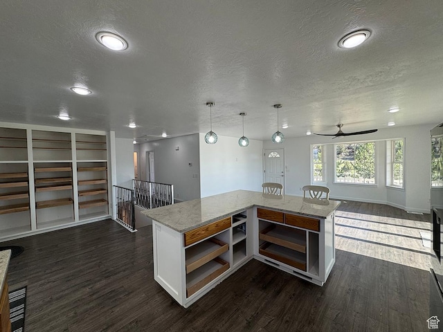 34840 N 10265 E, Fairview, UT 84629 - kitchen featuring a textured ceiling, open floor plan, open shelves, dark wood-style flooring, and a ceiling fan