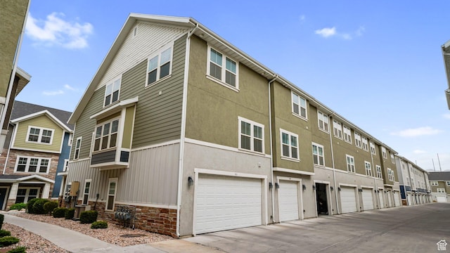 319 N 750 E, Vineyard, UT 84059 - view of building exterior with a garage
