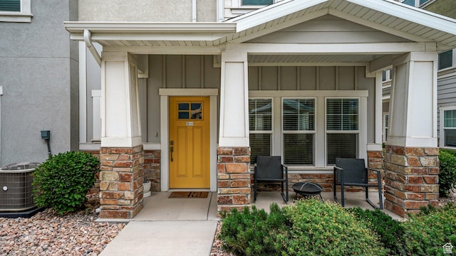 319 N 750 E, Vineyard, UT 84059 - property entrance with board and batten siding, covered porch, and stone siding