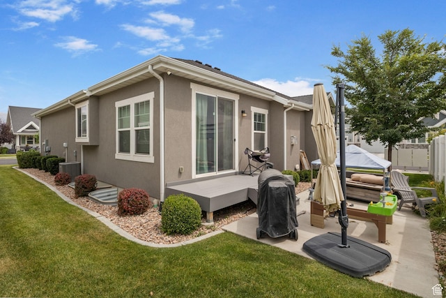 2319 N Penstemon Way, Lehi, UT 84043 - rear view of property with a deck, stucco siding, and a patio