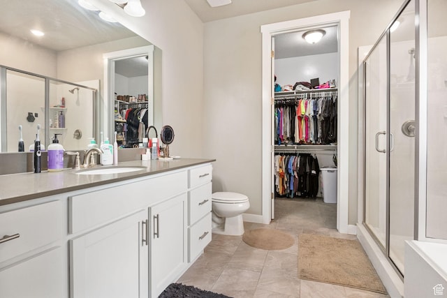 2319 N Penstemon Way, Lehi, UT 84043 - full bath with vanity, a spacious closet, a stall shower, and tile patterned flooring