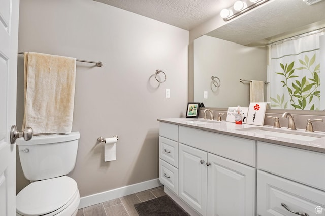 2319 N Penstemon Way, Lehi, UT 84043 - full bath with double vanity, wood tiled floors, and a textured ceiling