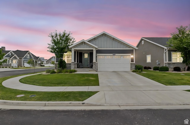 2319 N Penstemon Way, Lehi, UT 84043 - craftsman inspired home featuring stone siding, an attached garage, a front yard, and concrete driveway