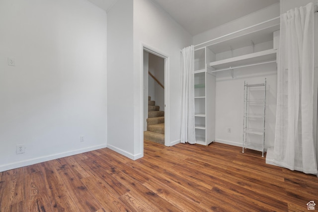 1145 Kensington Ave, Salt Lake City, UT 84105 - unfurnished bedroom featuring wood finished floors and baseboards