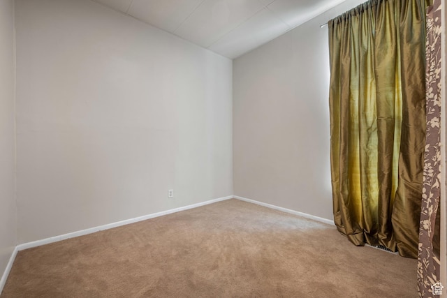 1145 Kensington Ave, Salt Lake City, UT 84105 - spare room with light carpet and lofted ceiling