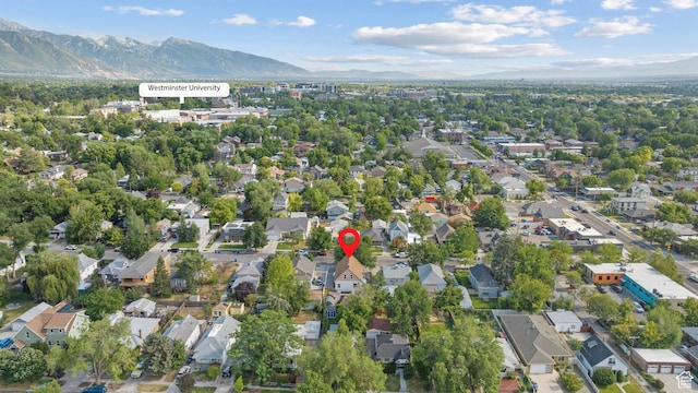 1145 Kensington Ave, Salt Lake City, UT 84105 - aerial view of property's location featuring a mountain backdrop and nearby suburban area