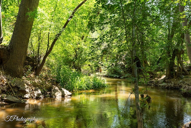 503 S Cottonwood Dr, Brookside, UT 84782 - water view featuring a heavily wooded area