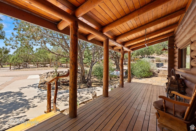 503 S Cottonwood Dr, Brookside, UT 84782 - wooden deck with view of wooded area