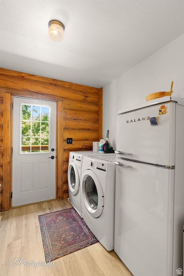 503 S Cottonwood Dr, Brookside, UT 84782 - washroom featuring rustic walls, independent washer and dryer, and light wood finished floors