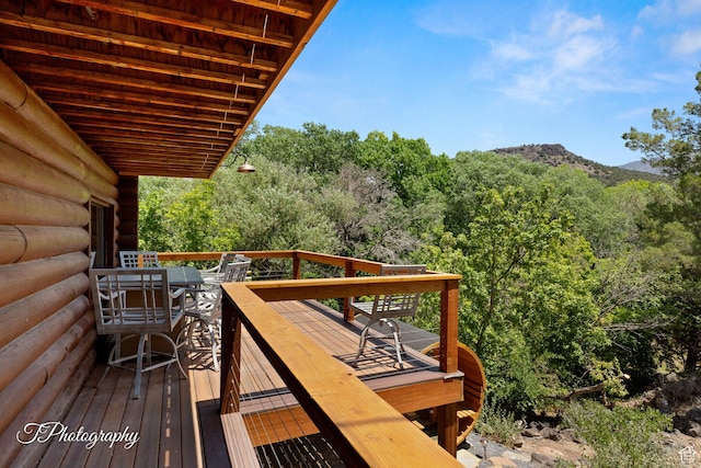 503 S Cottonwood Dr, Brookside, UT 84782 - wooden deck featuring a view of trees and a mountain view