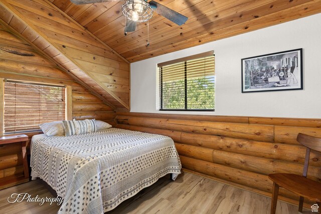 503 S Cottonwood Dr, Brookside, UT 84782 - bedroom featuring log walls, wood ceiling, vaulted ceiling, and wood finished floors