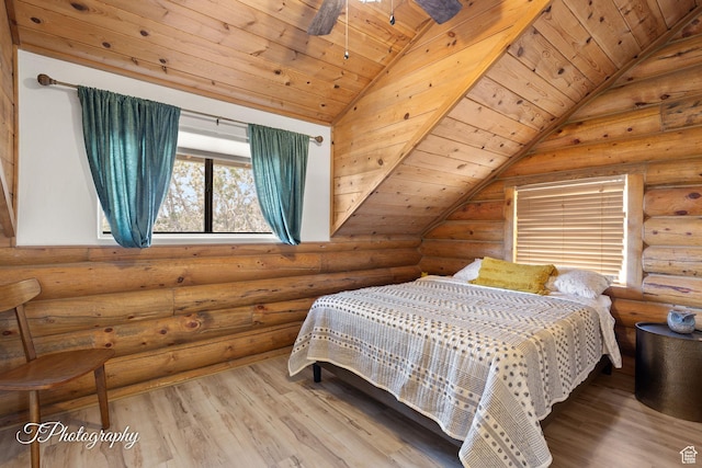 503 S Cottonwood Dr, Brookside, UT 84782 - bedroom featuring log walls, lofted ceiling, wood finished floors, and wooden ceiling