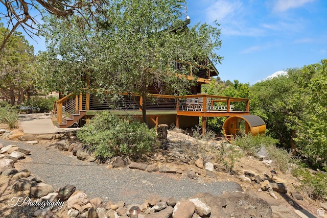 503 S Cottonwood Dr, Brookside, UT 84782 - back of house with log exterior, a deck, and stairs