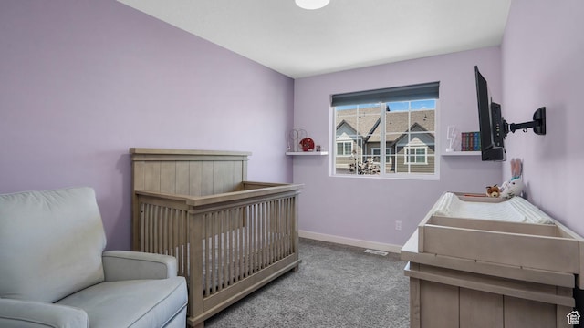 5681 W Pelican Ridge Ln, Salt Lake City, UT 84118 - bedroom featuring carpet floors and a nursery area