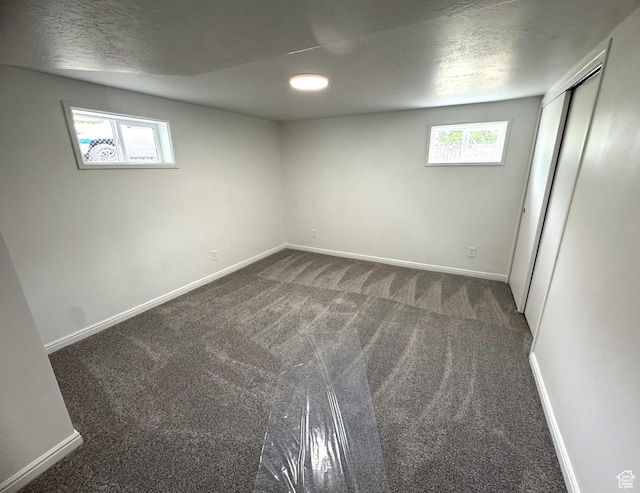 434 W Alta View Dr S, Midvale, UT 84047 - below grade area featuring carpet and a textured ceiling