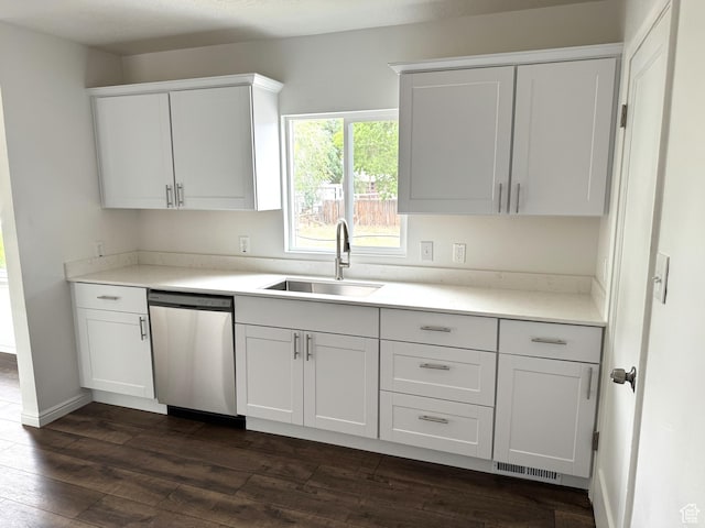 434 W Alta View Dr S, Midvale, UT 84047 - kitchen with stainless steel dishwasher, dark wood-style flooring, light countertops, and white cabinets