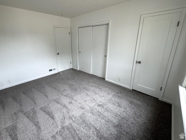 434 W Alta View Dr S, Midvale, UT 84047 - unfurnished bedroom featuring dark carpet and baseboards