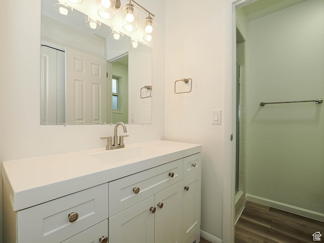 9971 S Borg Dr, Sandy, UT 84092 - full bathroom featuring vanity, an enclosed shower, and wood finished floors