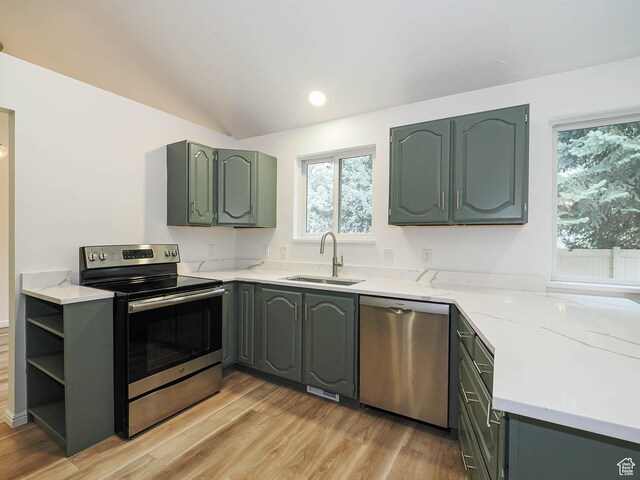 9971 S Borg Dr, Sandy, UT 84092 - kitchen featuring appliances with stainless steel finishes, light wood finished floors, vaulted ceiling, recessed lighting, and open shelves