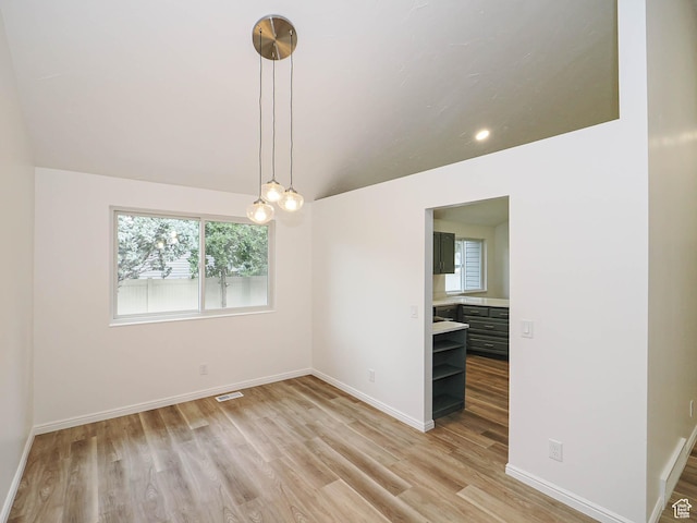 9971 S Borg Dr, Sandy, UT 84092 - empty room featuring lofted ceiling, light wood-type flooring, and recessed lighting
